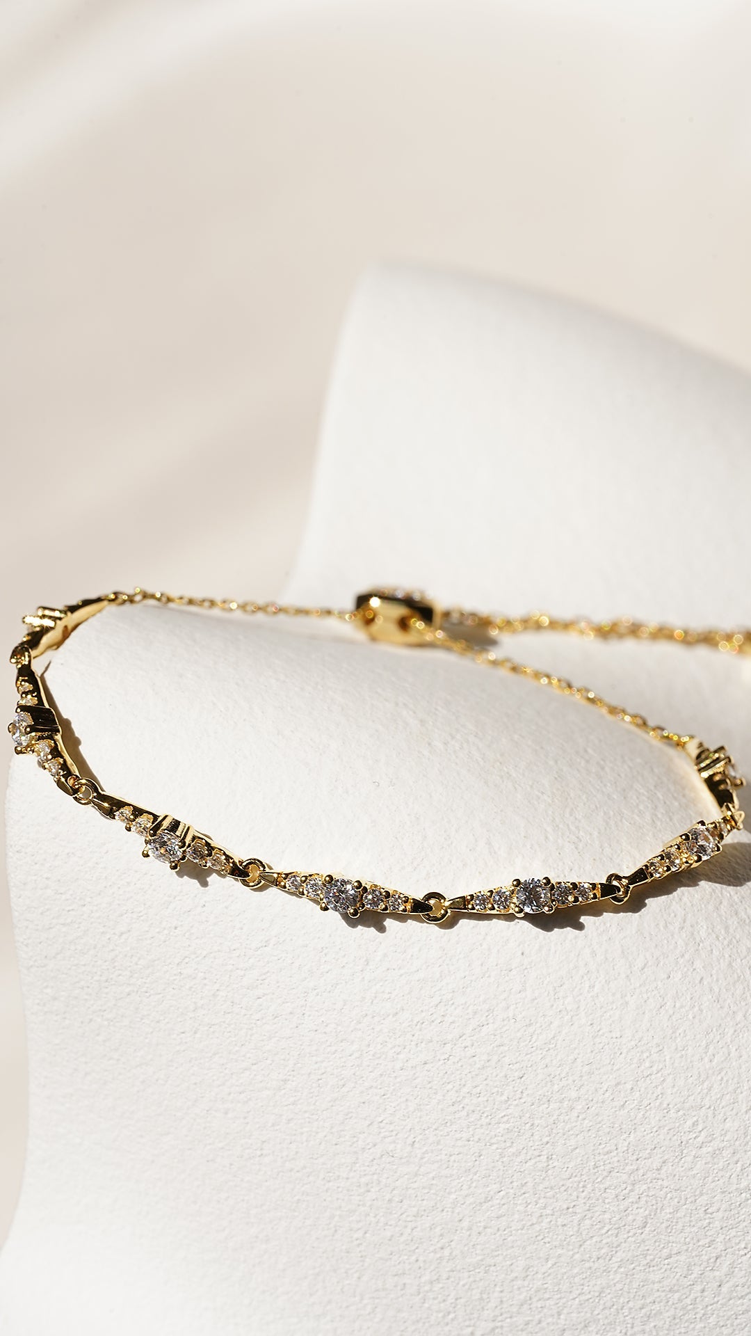 Gold slider bracelet with star design