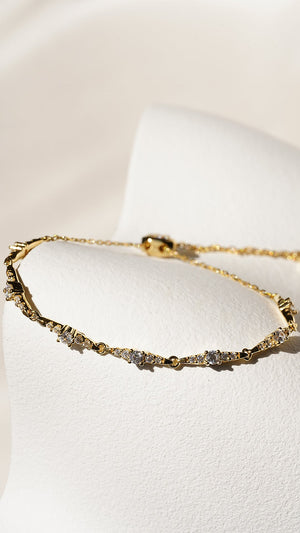Gold slider bracelet with star design