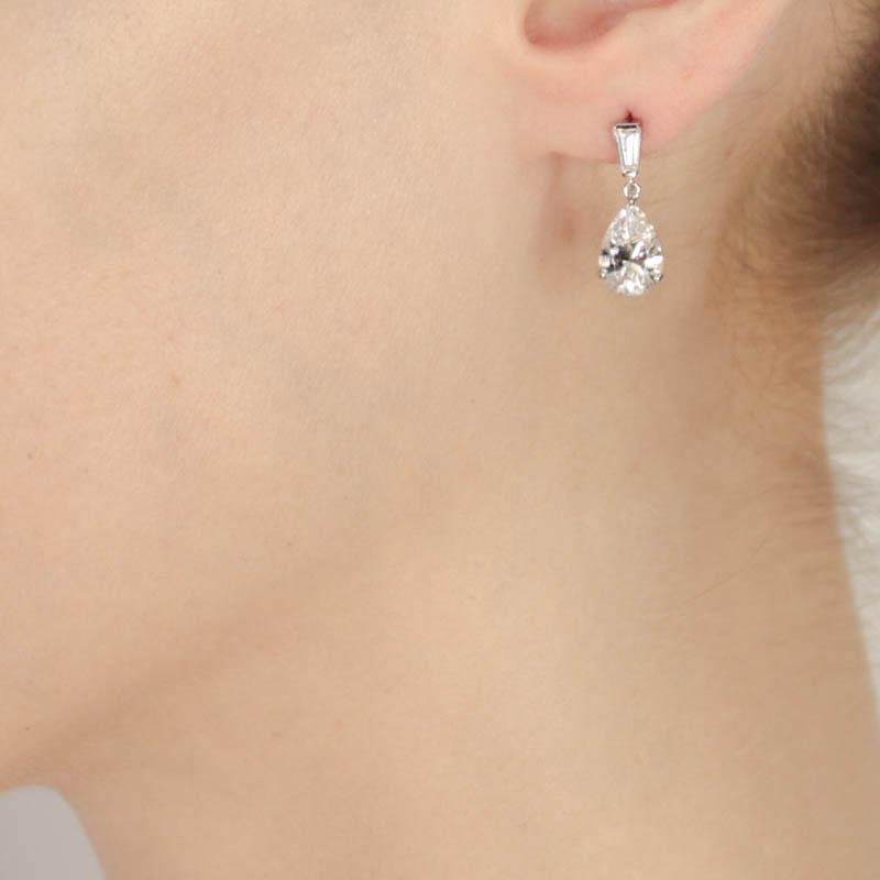 9K White Gold Drop Earrings - Pear and baguette cut design