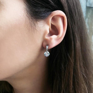 9K White Gold Drop Earrings - Round and baguette cut design