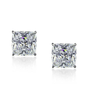 9K White Gold Stud Earrings - Cushion cut stones in martini setting